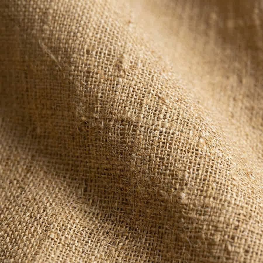 Close-up film of a tailored jacket being crafted in the workshop